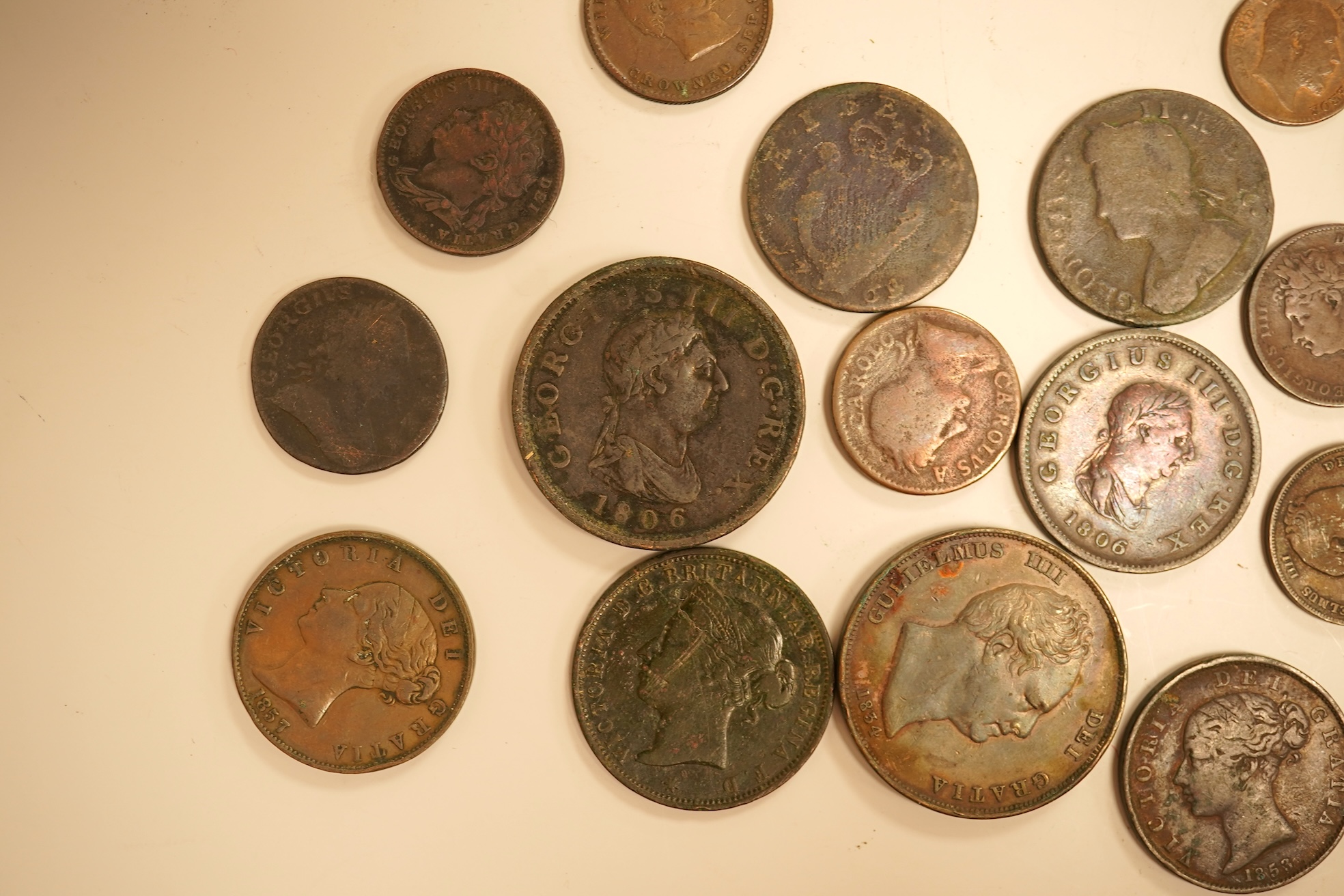 Twenty three copper coins including a William IV penny